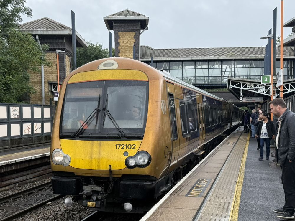 West Midlands Railway Class 172 Turbostar 172102 arriving at a platform.